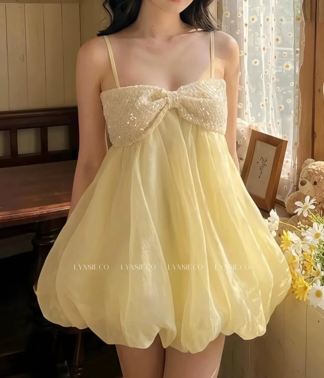 Ảnh 4 của Váy ngắn voan vàng nhạt nơ sequin