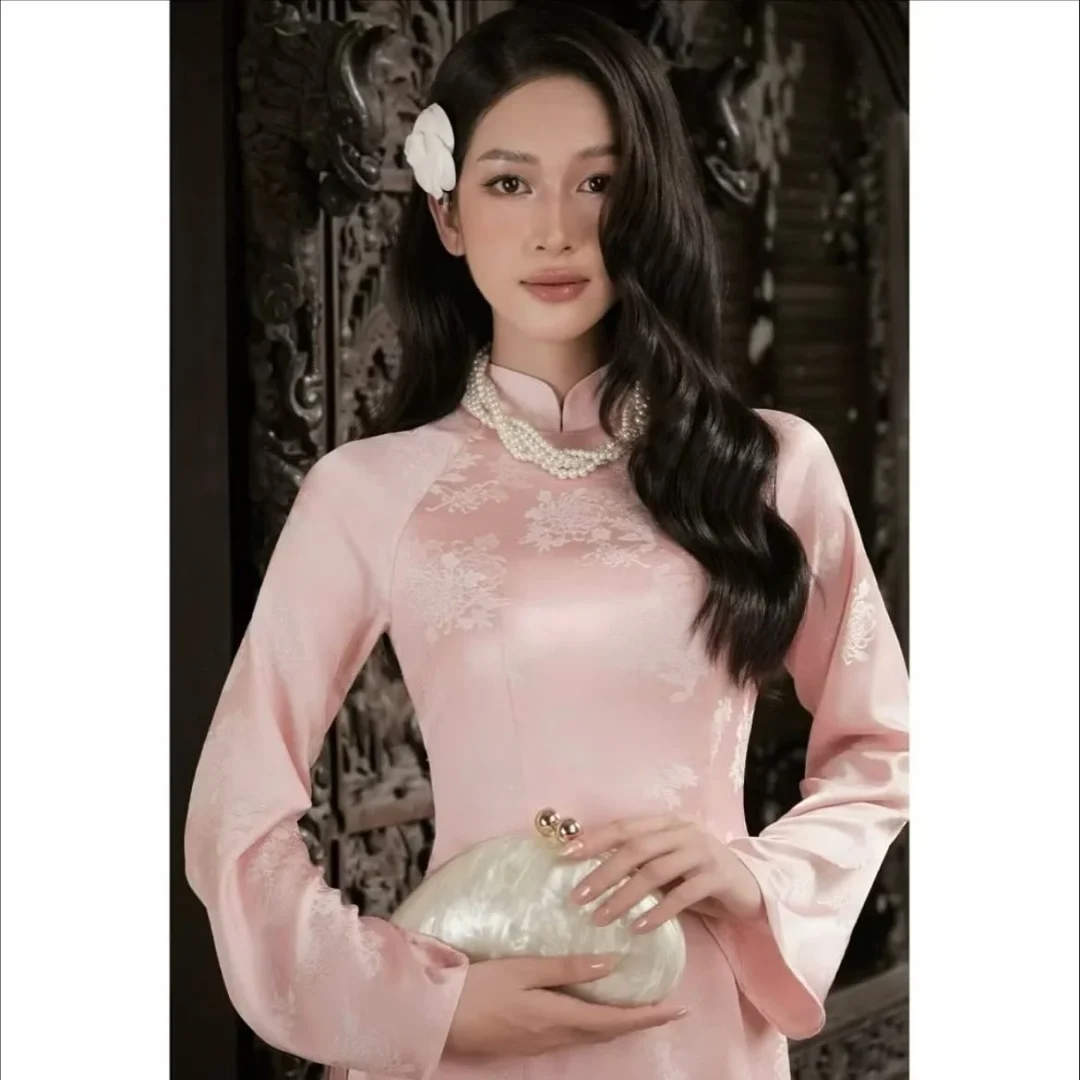 Photo 1 of Áo dài lụa hồng pastel ren hoa nữ