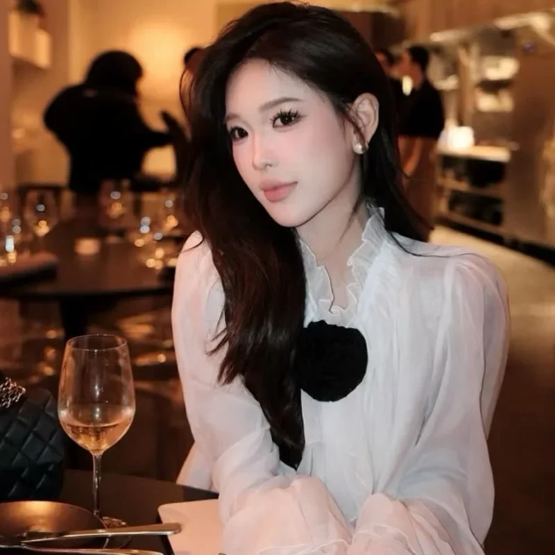 Photo 2 of Áo blouse trắng nữ voan nơ đen