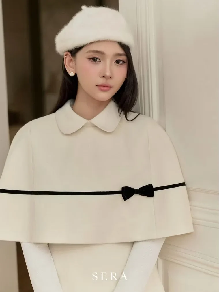 Ảnh 4 của Set áo cape váy ngắn trắng nữ