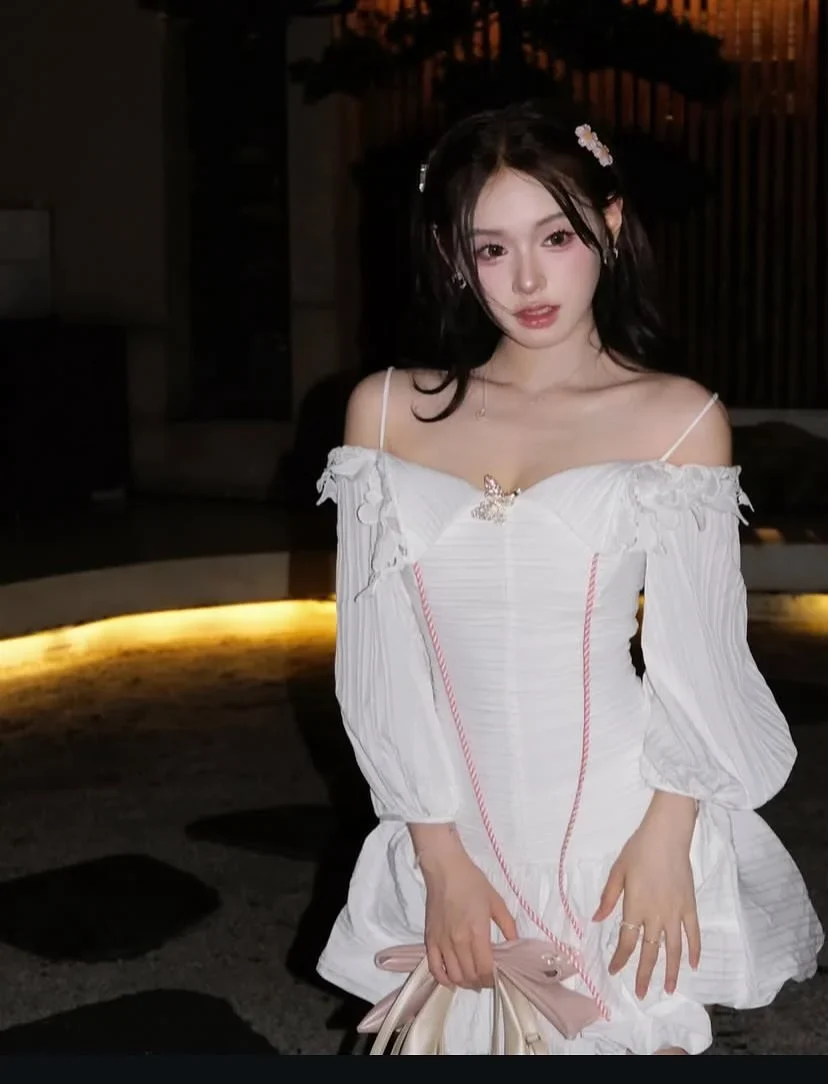 Photo 1 of Váy trắng trễ vai corset tay phồng
