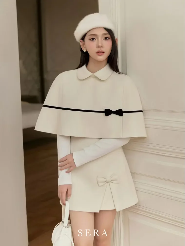 Ảnh 2 của Set áo cape váy ngắn trắng nữ