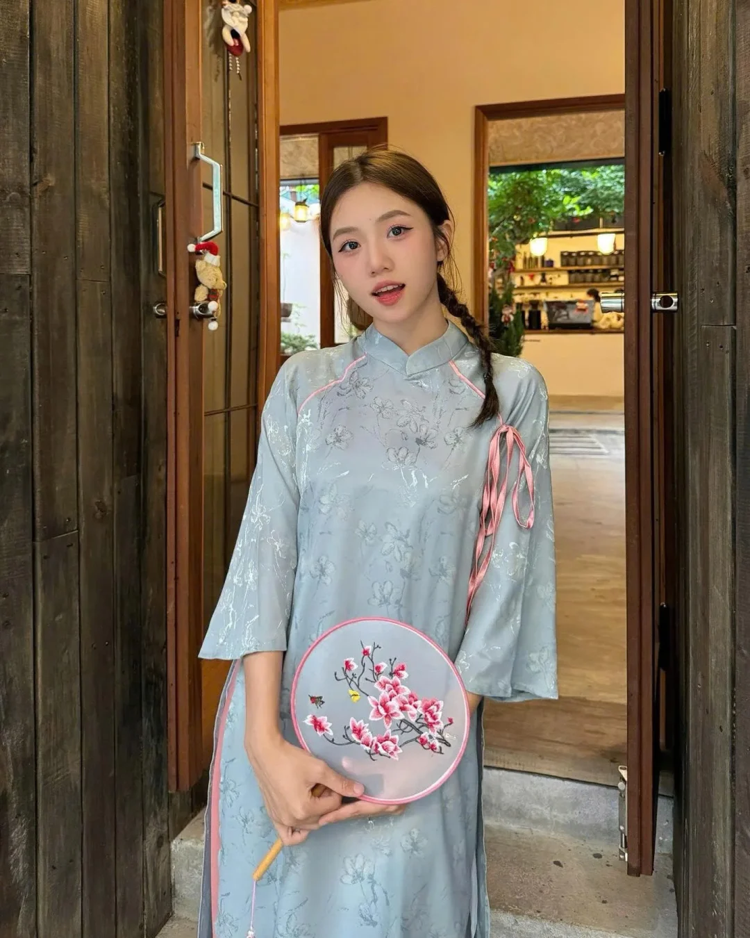 Photo 1 of Váy sườn xám lụa xanh nữ thanh lịch