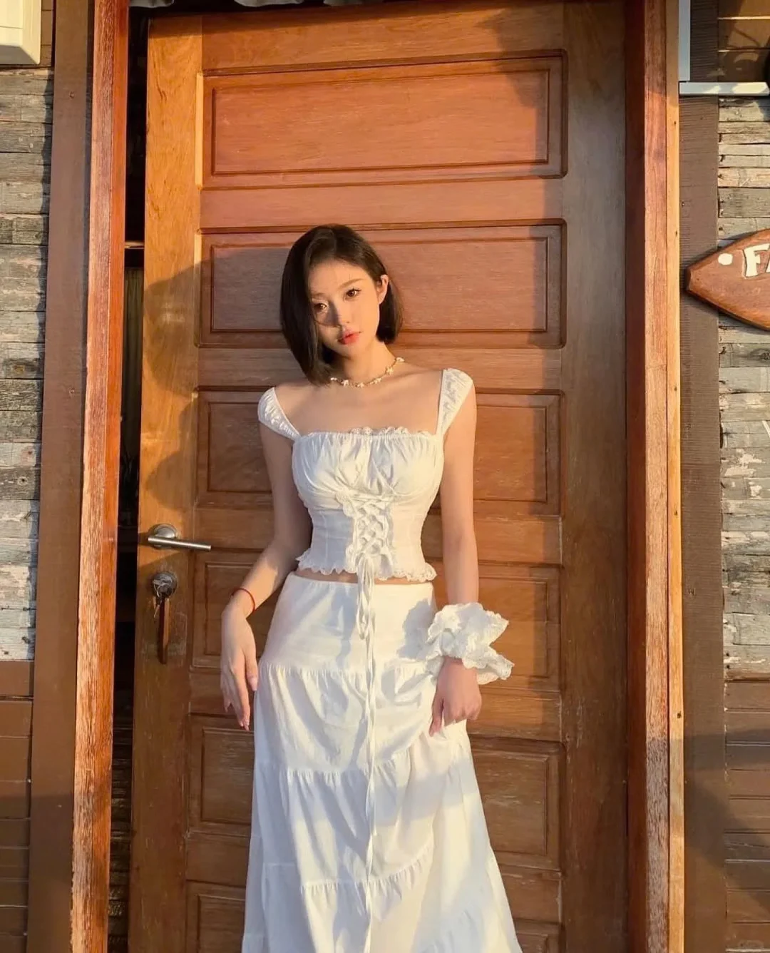 Photo 5 of Set áo váy trắng hai dây ren nữ