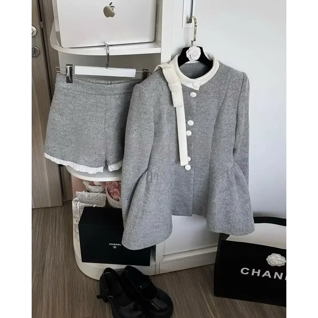 Photo 6 of Set áo khoác chân váy xám nơ trắng nữ