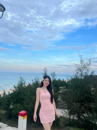 Photo 2 of Váy mini hồng nhạt ôm sát nữ