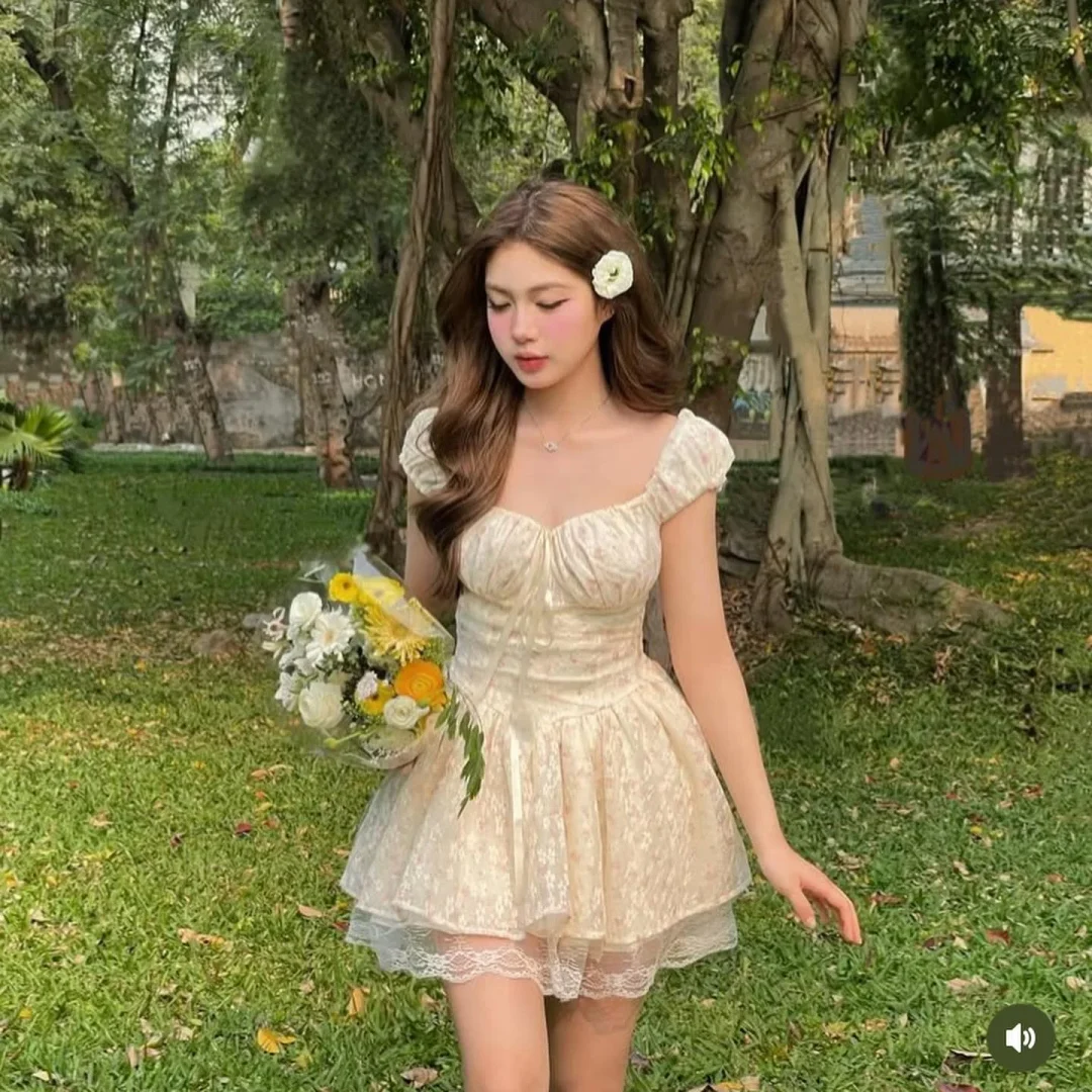 Photo 5 of Đầm trễ vai hoa nhí voan kem size M