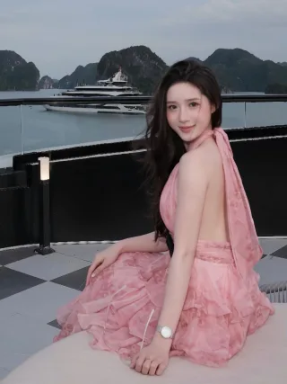 Photo 2 of Váy tiệc hồng voan tầng bèo nữ