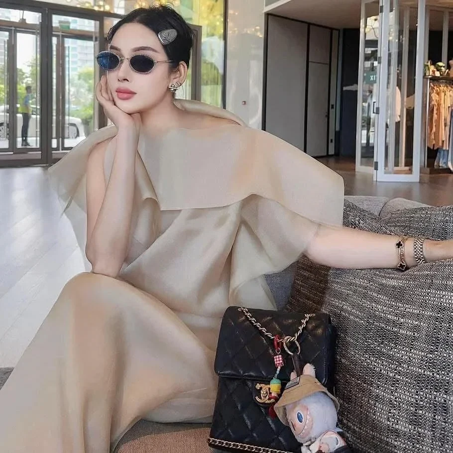 Photo 1 of Đầm lụa be lệch vai thanh lịch