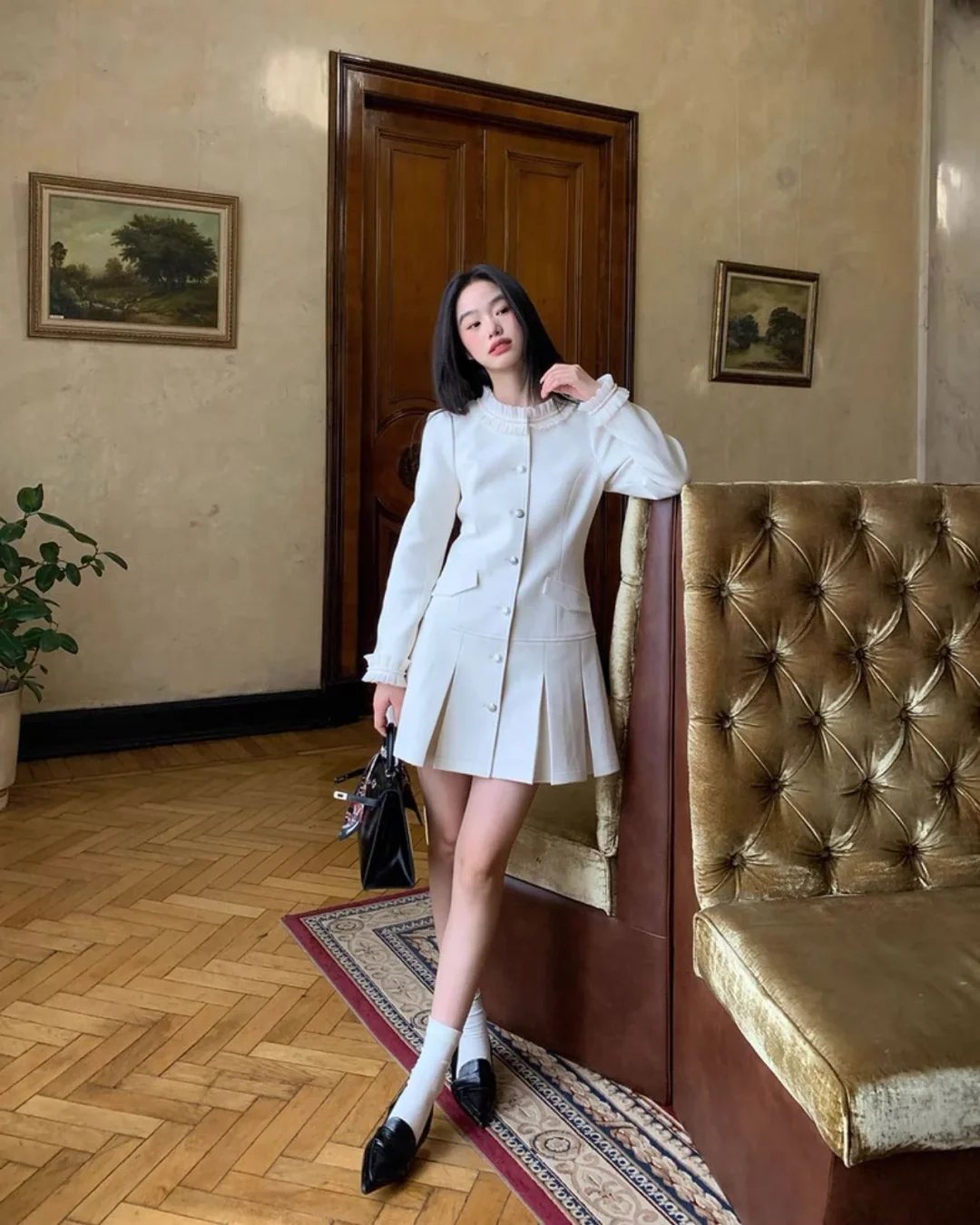 Photo 4 of Váy len trắng xếp li cổ ren KANO