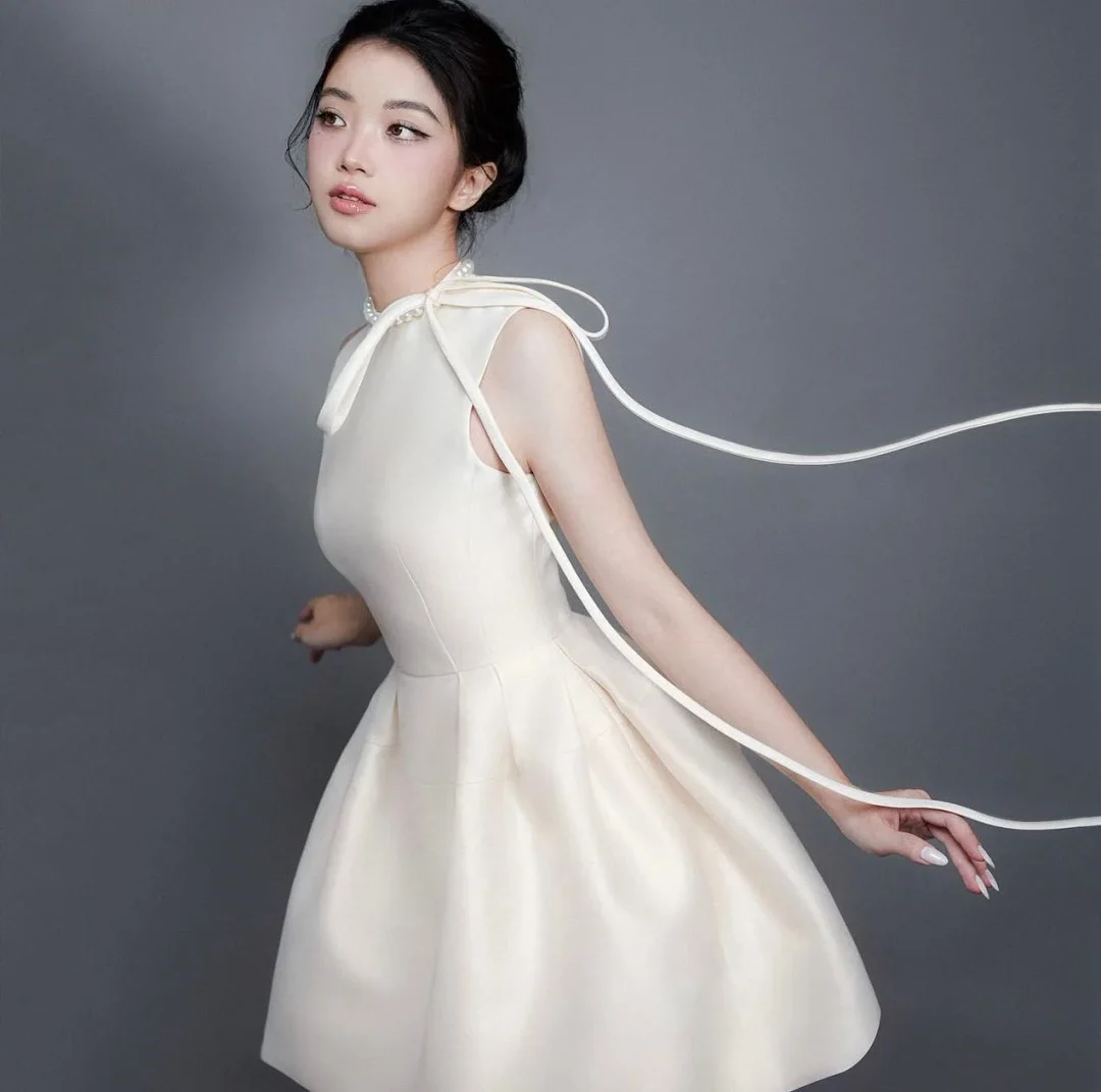 Ảnh 2 của Váy mini lụa kem GIANA size S