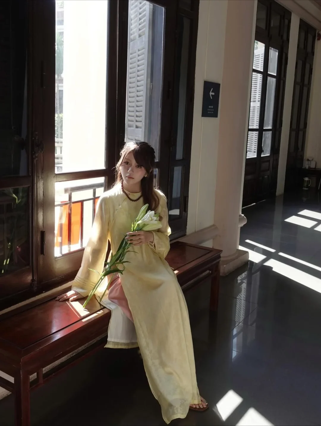 Photo 4 of Áo dài vàng nhạt Thanh Anh nữ