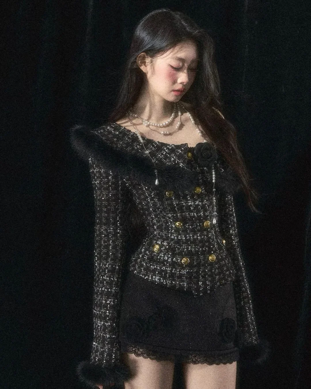 Photo 2 of Set áo tweed đen lệch vai và váy ngắn đính hoa