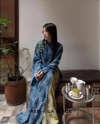 Photo 2 of Áo dài nữ xanh dương Mãn Anh Đường thêu rồng mây