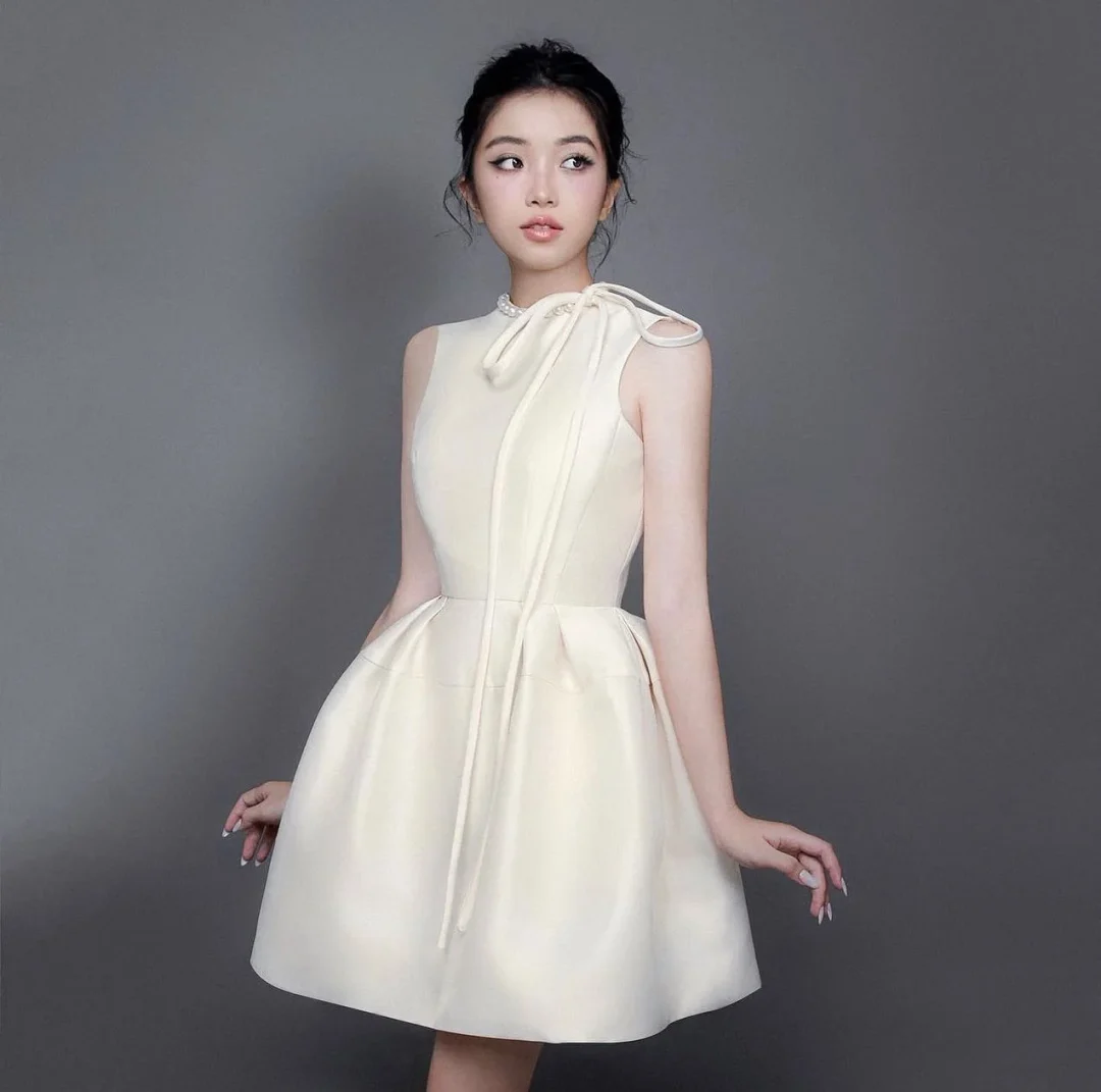 Ảnh 1 của Váy mini lụa kem GIANA size S