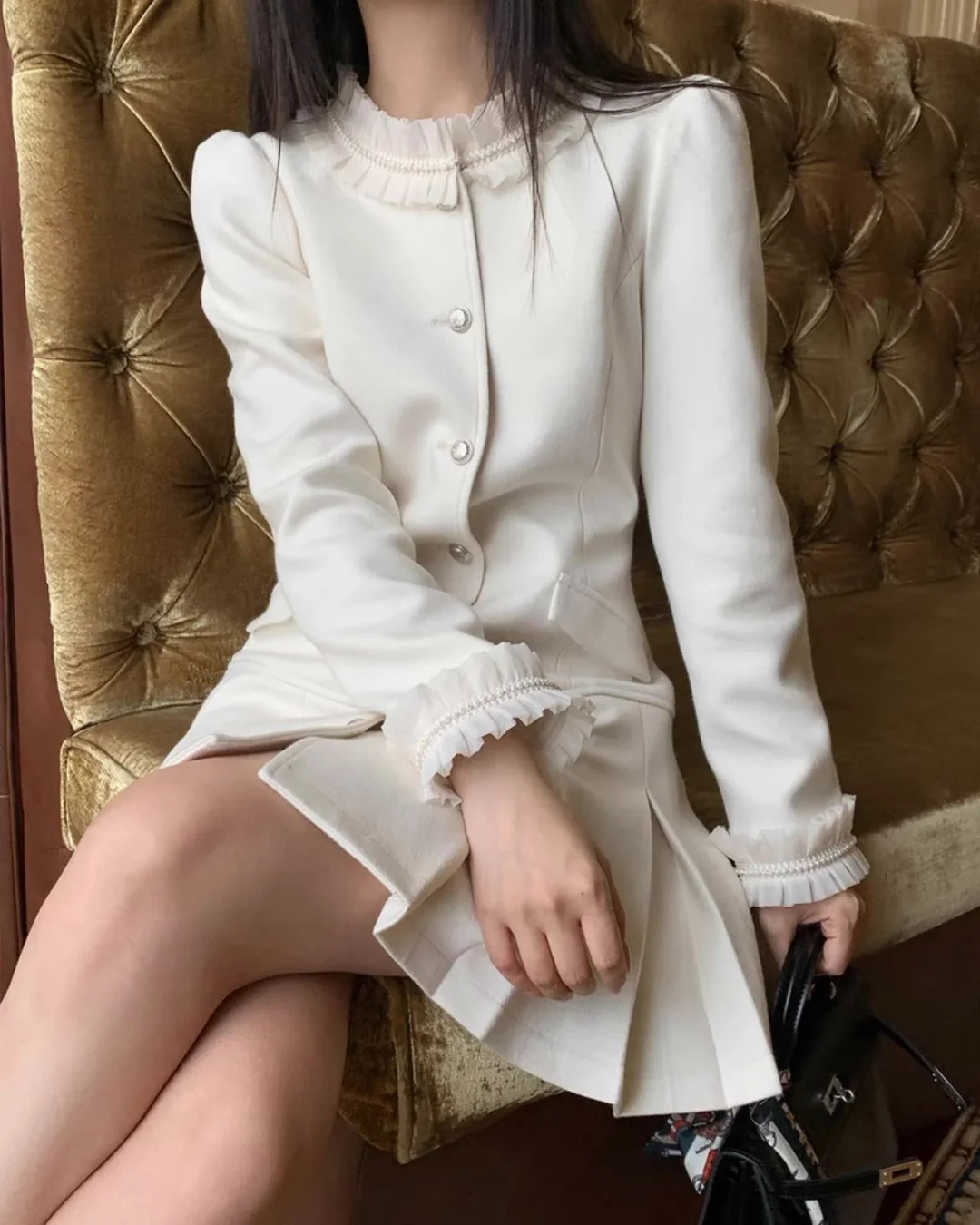 Photo 9 of Váy len trắng xếp li cổ ren KANO