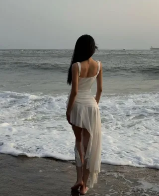 Photo 3 of Đầm tiệc trắng hai dây Mafee Couture