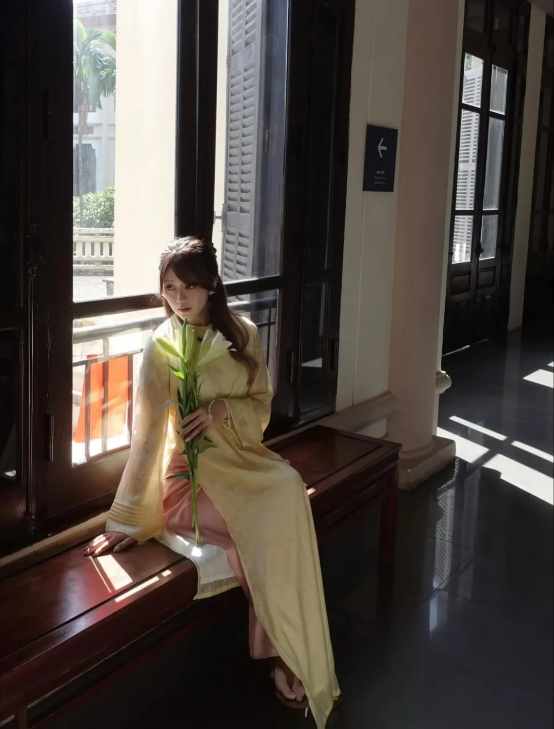 Photo 6 of Áo dài vàng nhạt Thanh Anh nữ