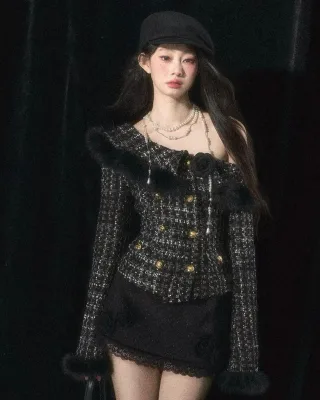 Photo 1 of Set áo tweed đen lệch vai và váy ngắn đính hoa