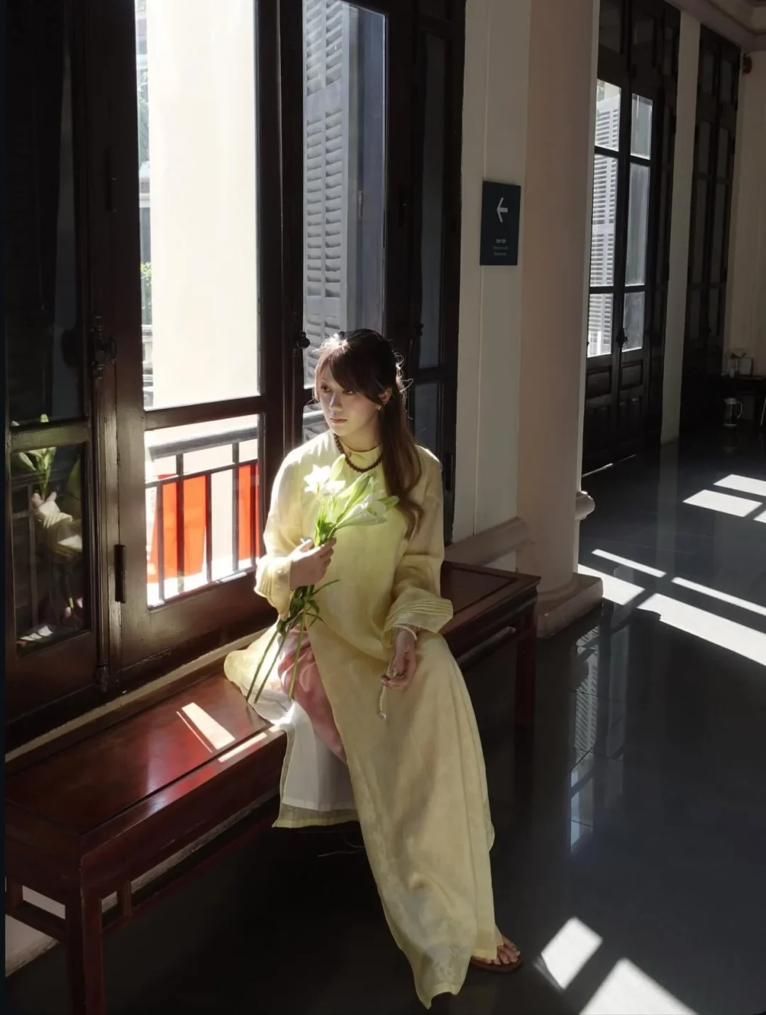 Photo 1 of Áo dài vàng nhạt Thanh Anh nữ