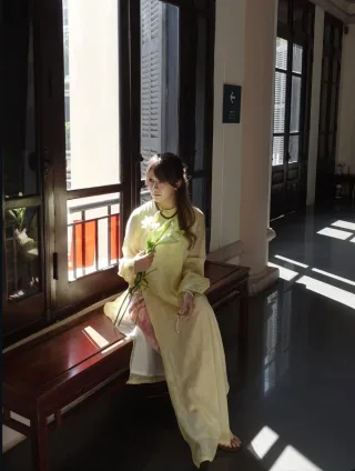 Photo 1 of Áo dài vàng nhạt Thanh Anh nữ