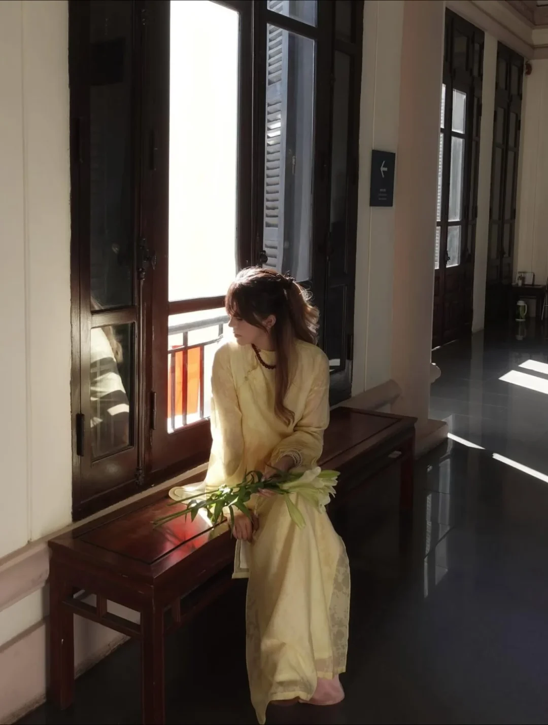 Photo 2 of Áo dài vàng nhạt Thanh Anh nữ