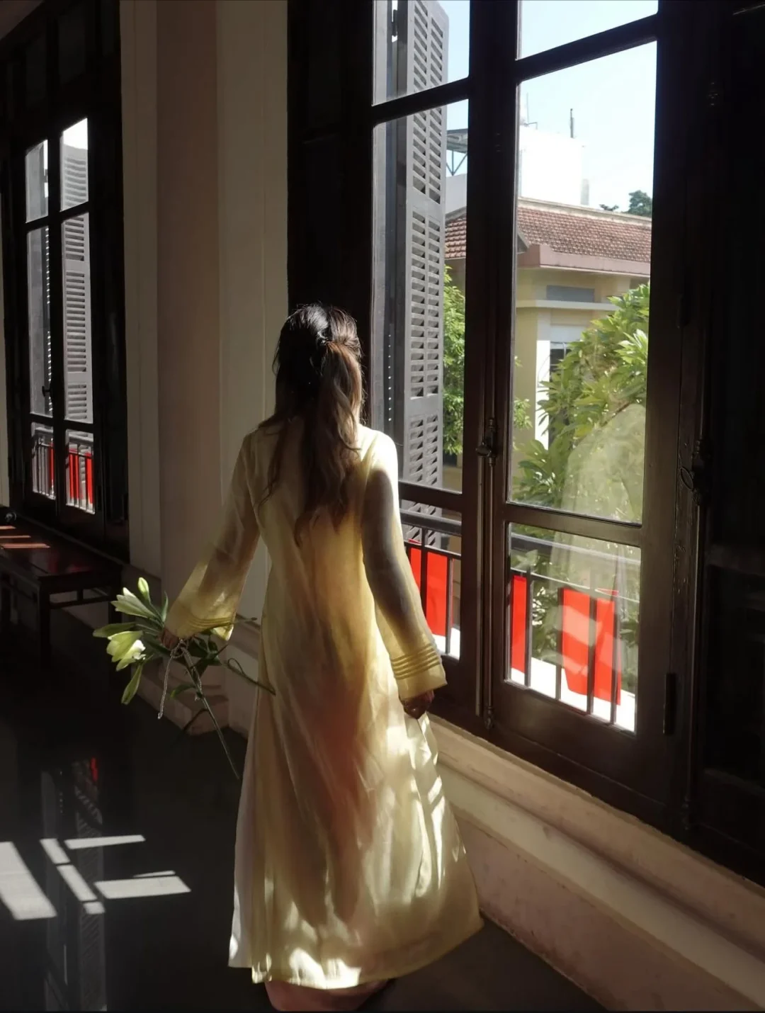 Photo 3 of Áo dài vàng nhạt Thanh Anh nữ
