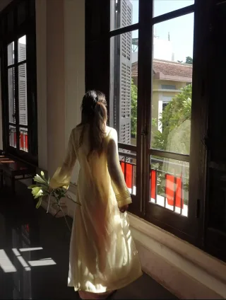 Photo 3 of Áo dài vàng nhạt Thanh Anh nữ