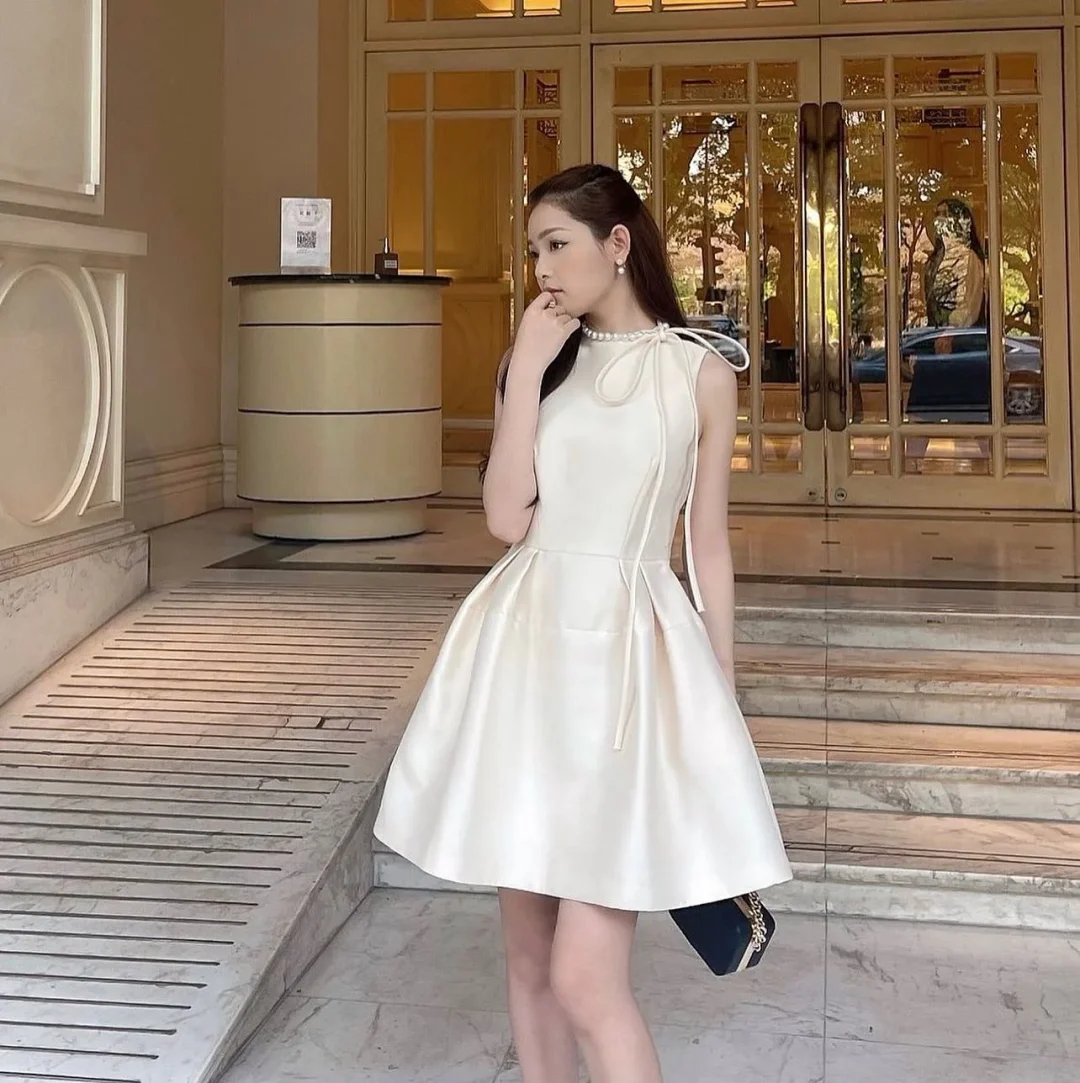 Ảnh 6 của Váy mini lụa kem GIANA size S